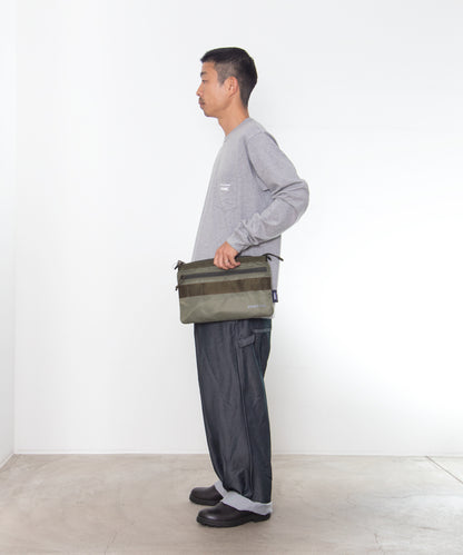 COMME des GARCONS HOMME / HR-K209 / BRIEFING W Name Reversible Sacoche Bag / 26FW / Khaki